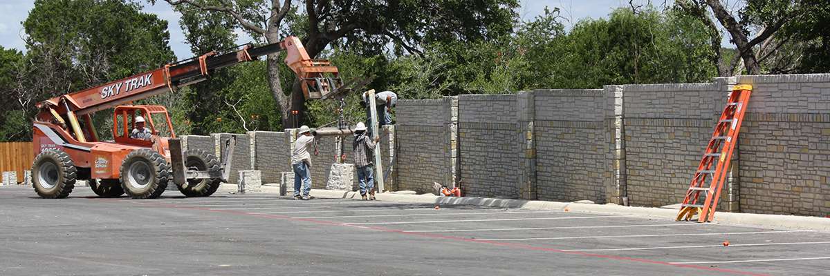 Men building wall